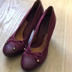 Burgundy heel.